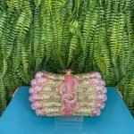 CLUTCH SWAROVISK LAÇO VERDE E ROSA