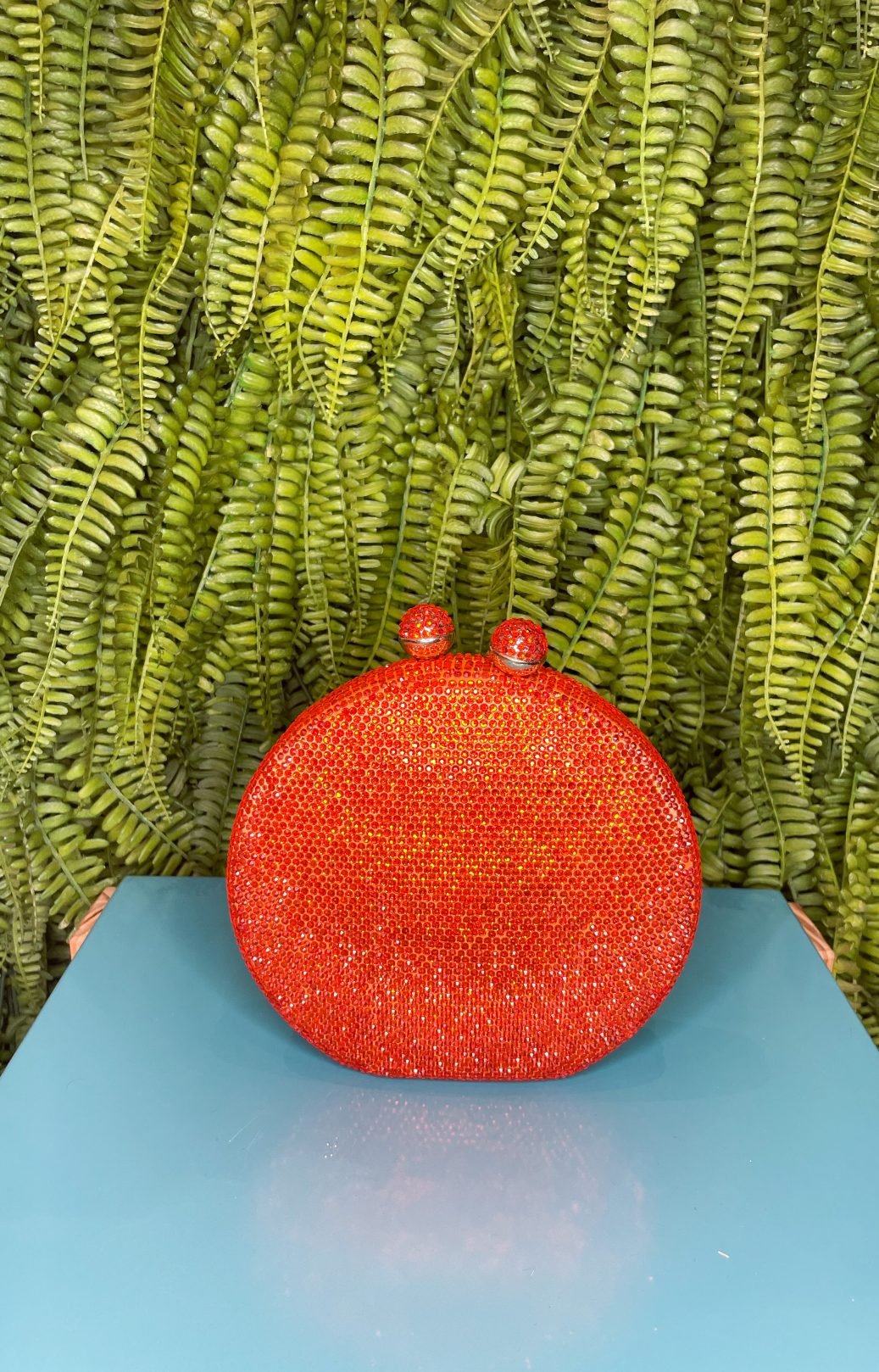 CLUTCH SWAROVSKI REDONDA LARANJA